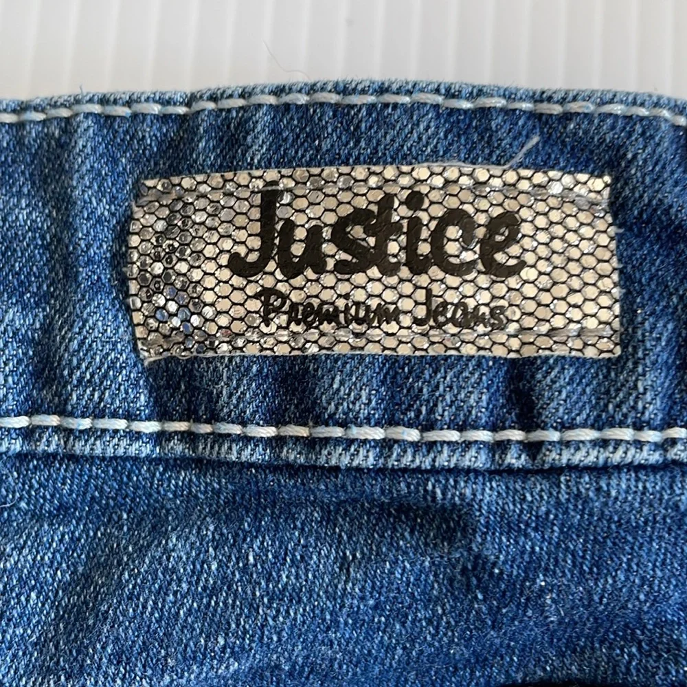Justice denim jean shorts with red, blue & silver sequins. Girls size 10
